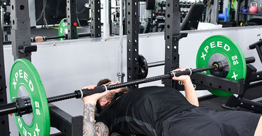 Man doing barbell bench press