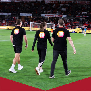 Fitness Warehouse Fastest Fan Competitors walking onto the soccer field