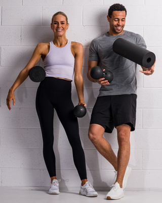 Man and woman enjoying fitness equipment
