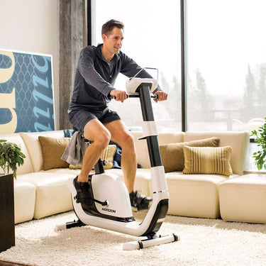 Man using Recumbent Bike at home