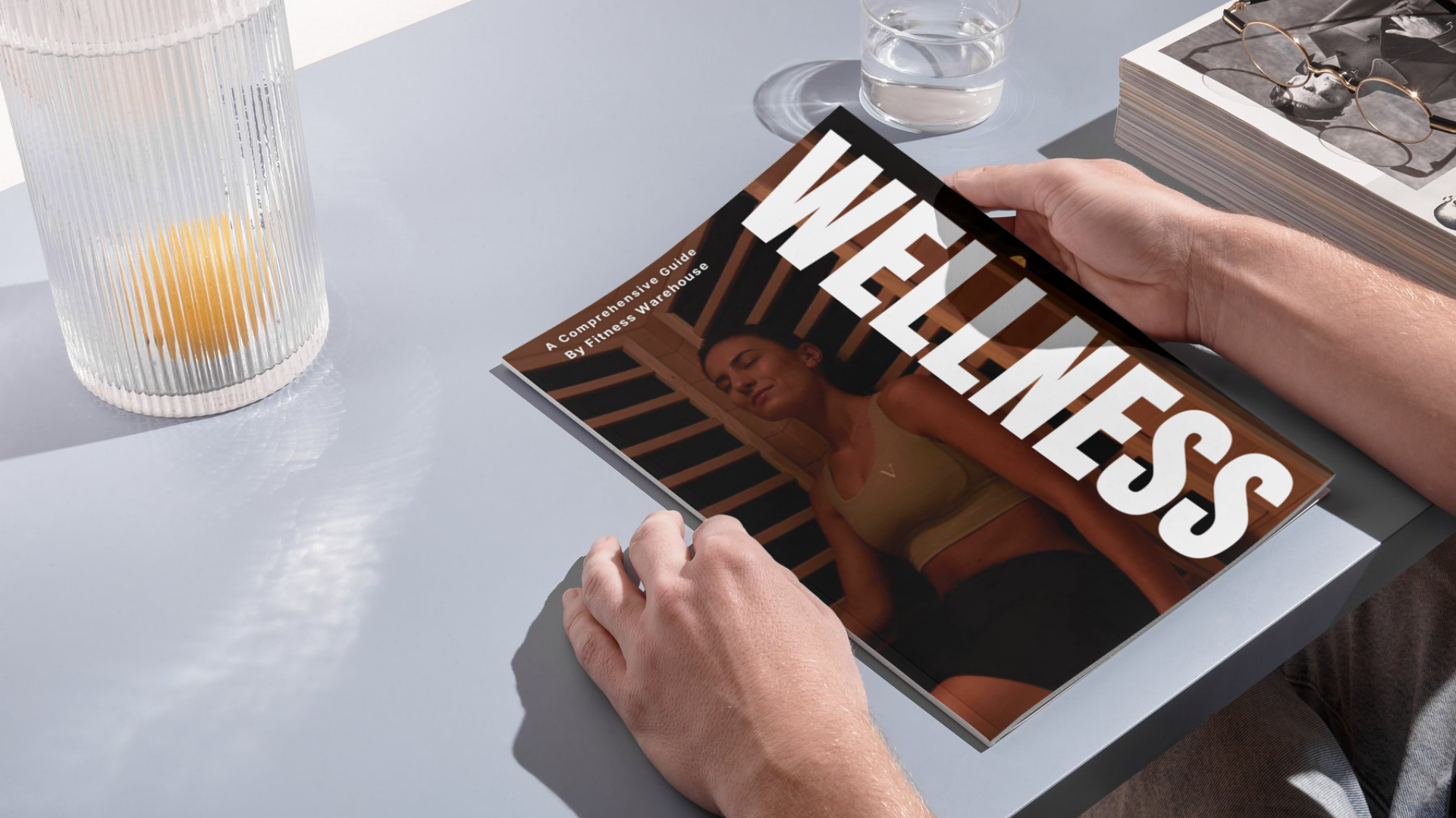 Person holding the free comprehensive wellness guide