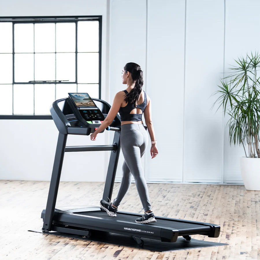 lady walking on her treadmill