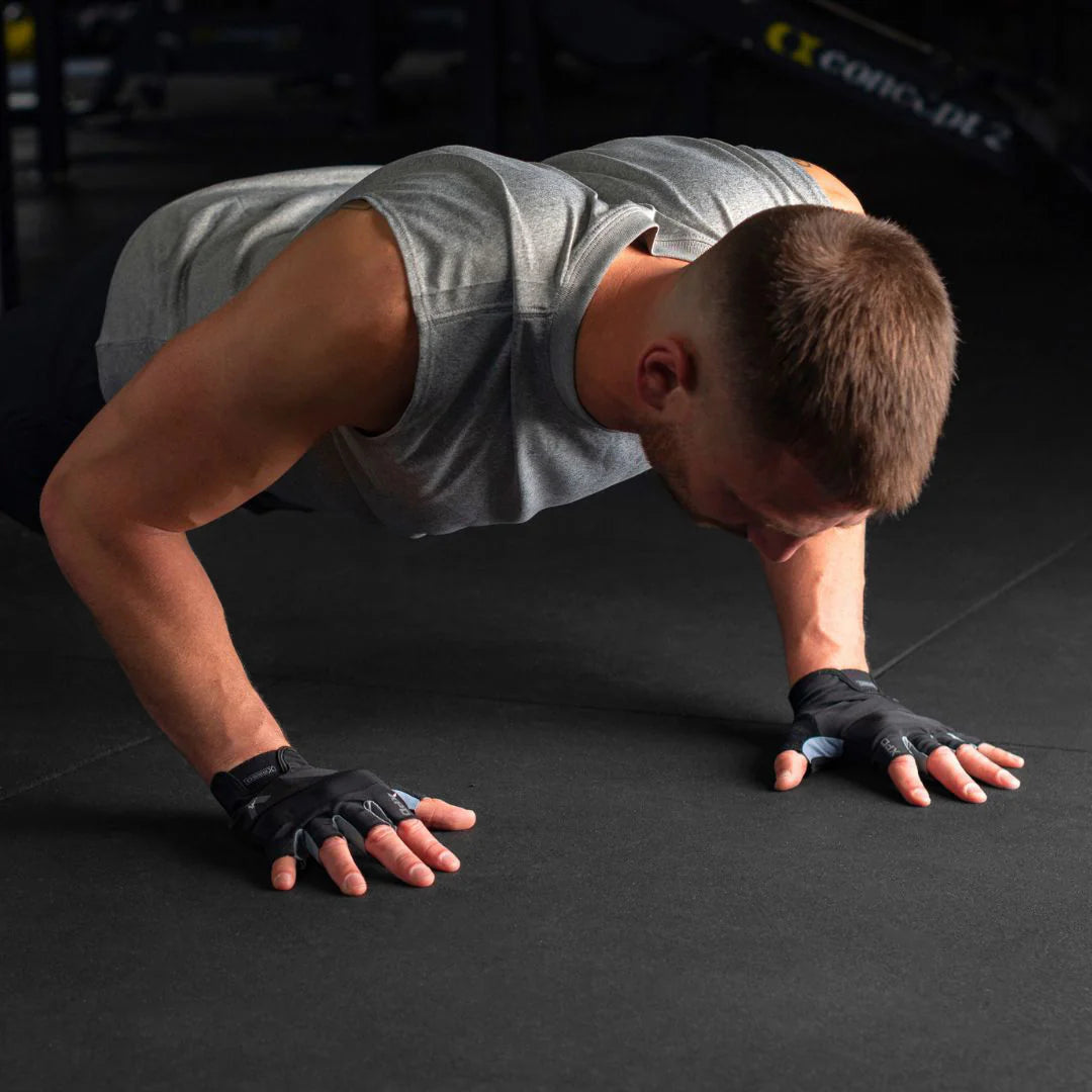 Man performing a push up with Xpeed Hyper Lite gloves on
