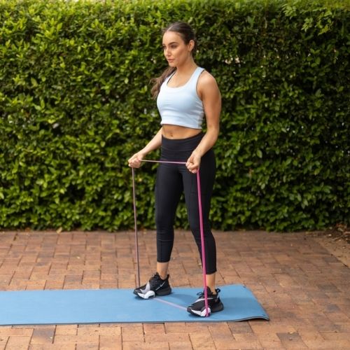 Female Training with an Xpeed Powerband for Strength Training