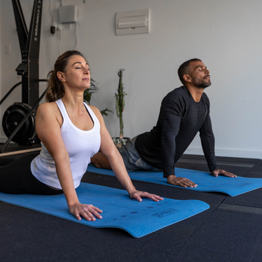 Couple doing Yoga Workout