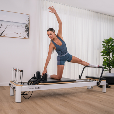 Woman doing Reformer Pilates