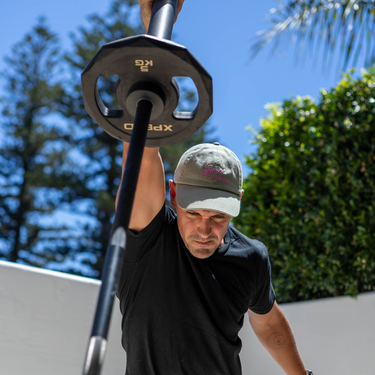 Man doing landmine press