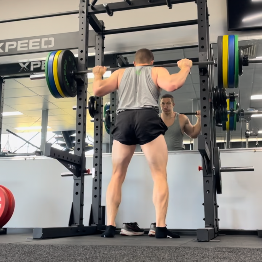 Man doing a barbell squat