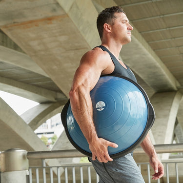 Strong athleter with the Bosu Ball Sport Balance Trainer